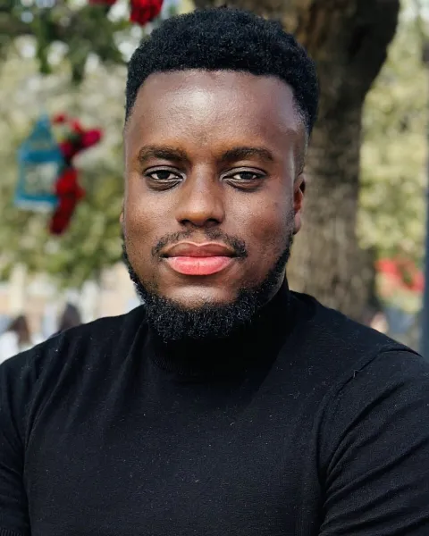 Professional headshot of Claude Hutchful, PMP